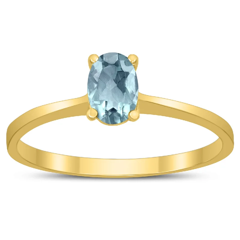 women modern luxury engagement rings -Oval Solitaire 6X4Mm Aquamarine Ring In 10K Yellow Gold