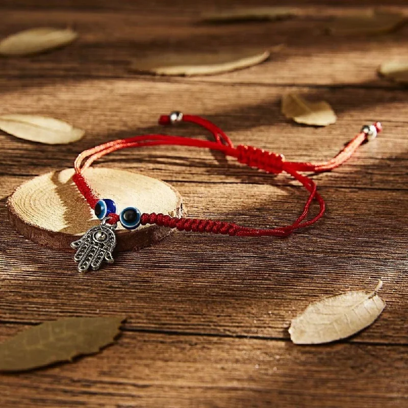 women stacking bracelets -Red String Hamsa Hand Bracelet