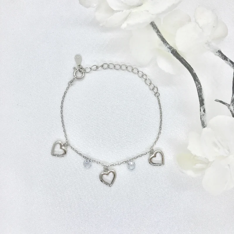 women crystal bracelets -Children's 925 Sterling Silver Dangling Hearts and CZ Bracelet